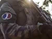 French soldier with Nazi slogan